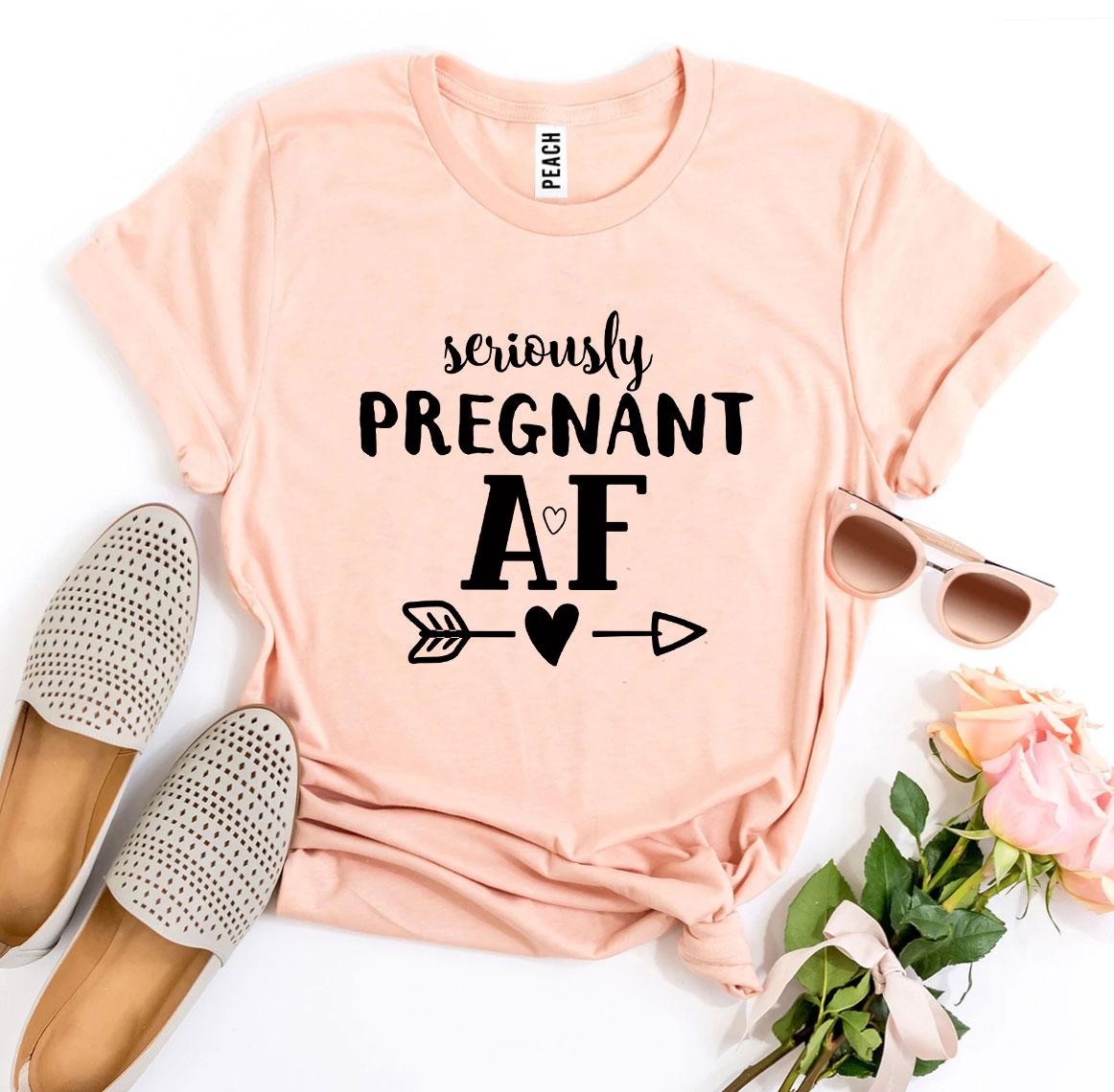 Seriously Pregnant AF T-shirt made of premium ring spun cotton, featuring a humorous design and available in various sizes.