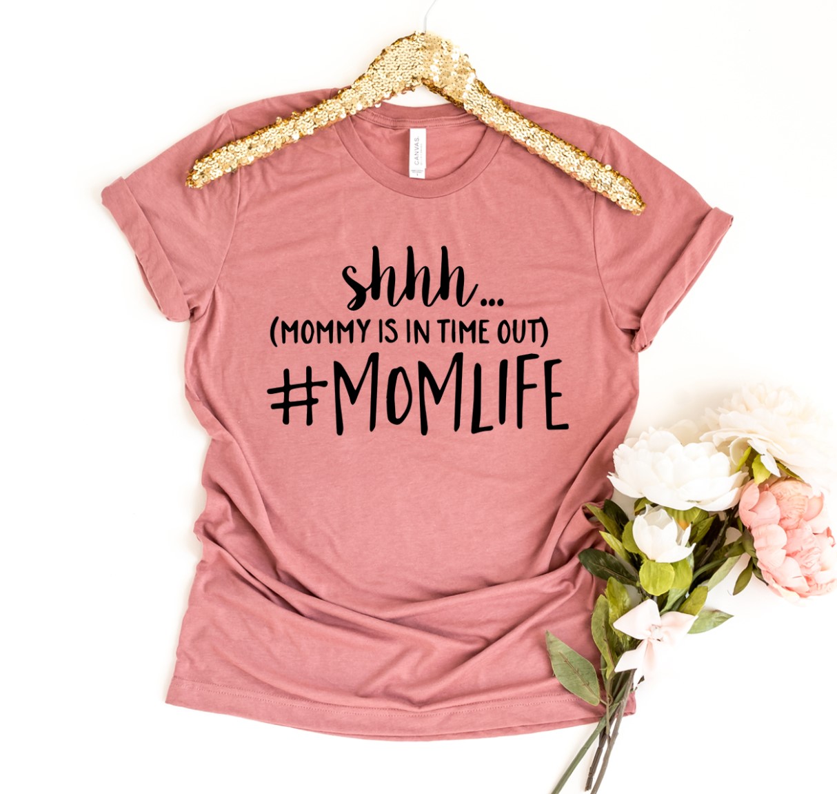 Shhh Mommy Is In Time Out T-shirt made of soft ring spun cotton with a humorous print, available in various sizes.