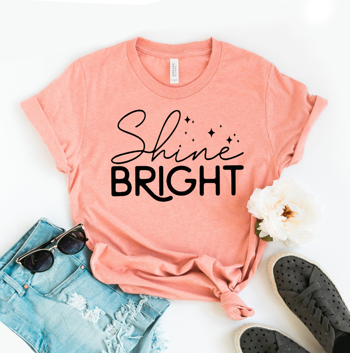 Shine Bright T-shirt made of premium ring spun cotton, featuring a vibrant flex print design, available in various sizes.