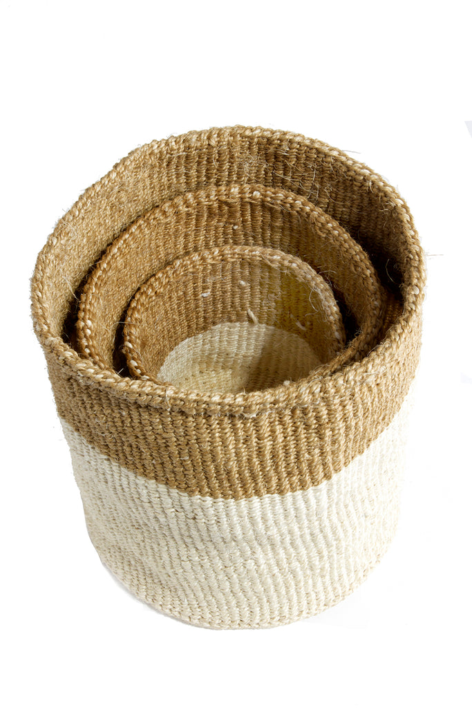 A set of three handwoven sisal baskets in various sizes, showcasing vibrant colors and intricate patterns, perfect for storage or as planters.