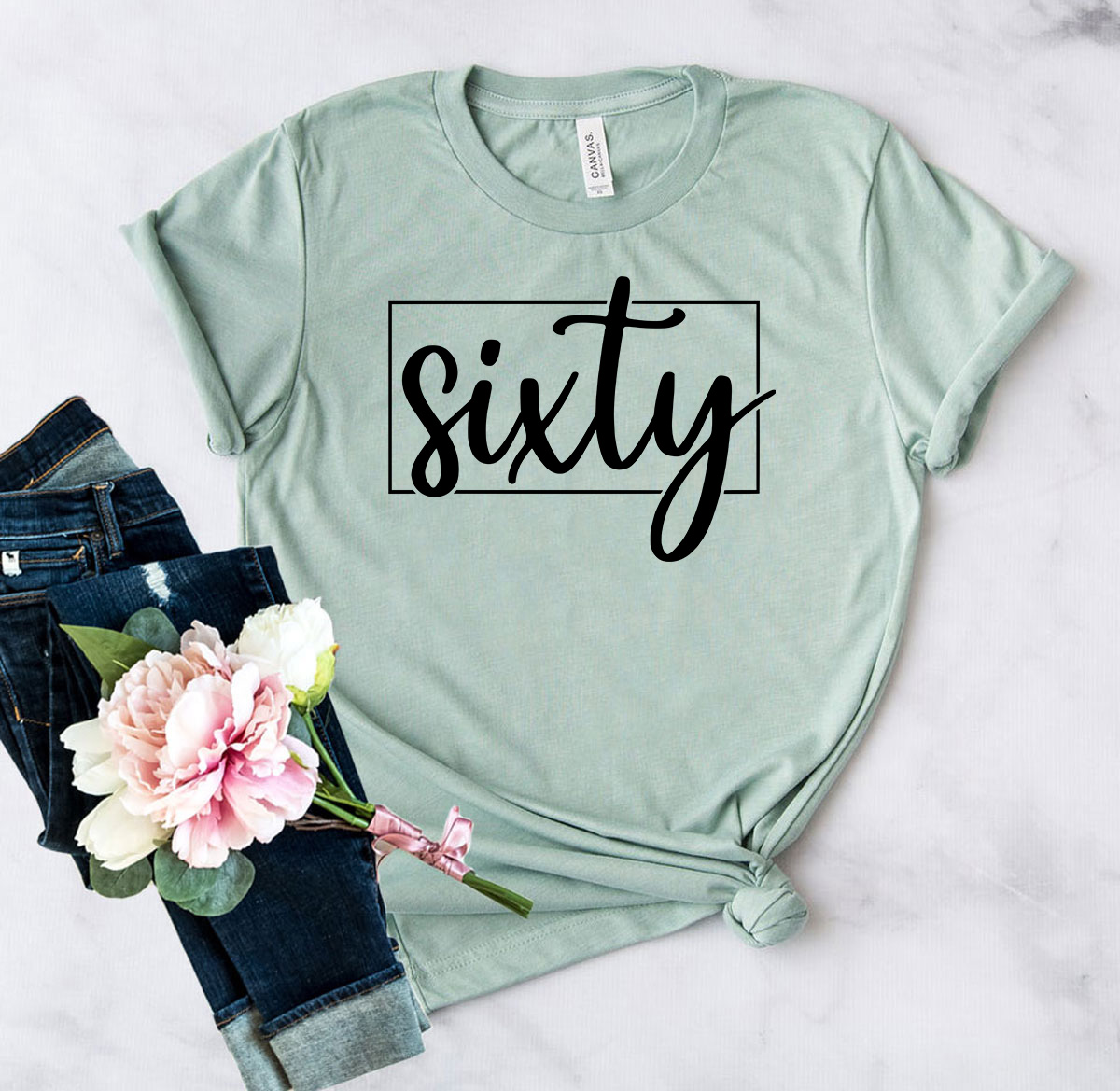 A stylish unisex Sixty Shirt made from soft ring spun cotton, available in multiple colors and sizes, featuring a classic crew neck and short sleeves.