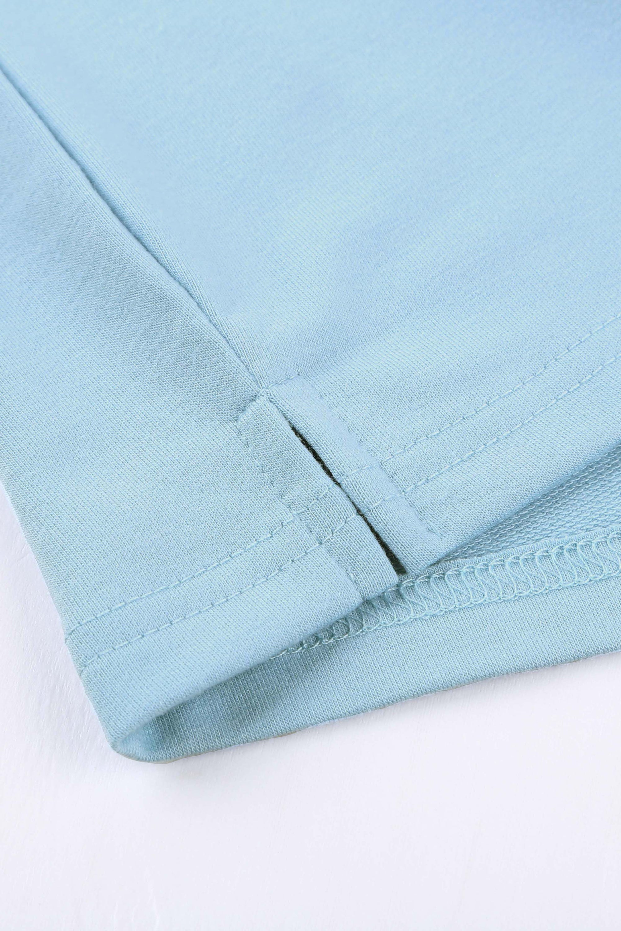 Sky Blue Knit Pocketed Side Slits Short Sleeve Tee featuring a relaxed fit, bust pocket, and side slits, perfect for summer wear.