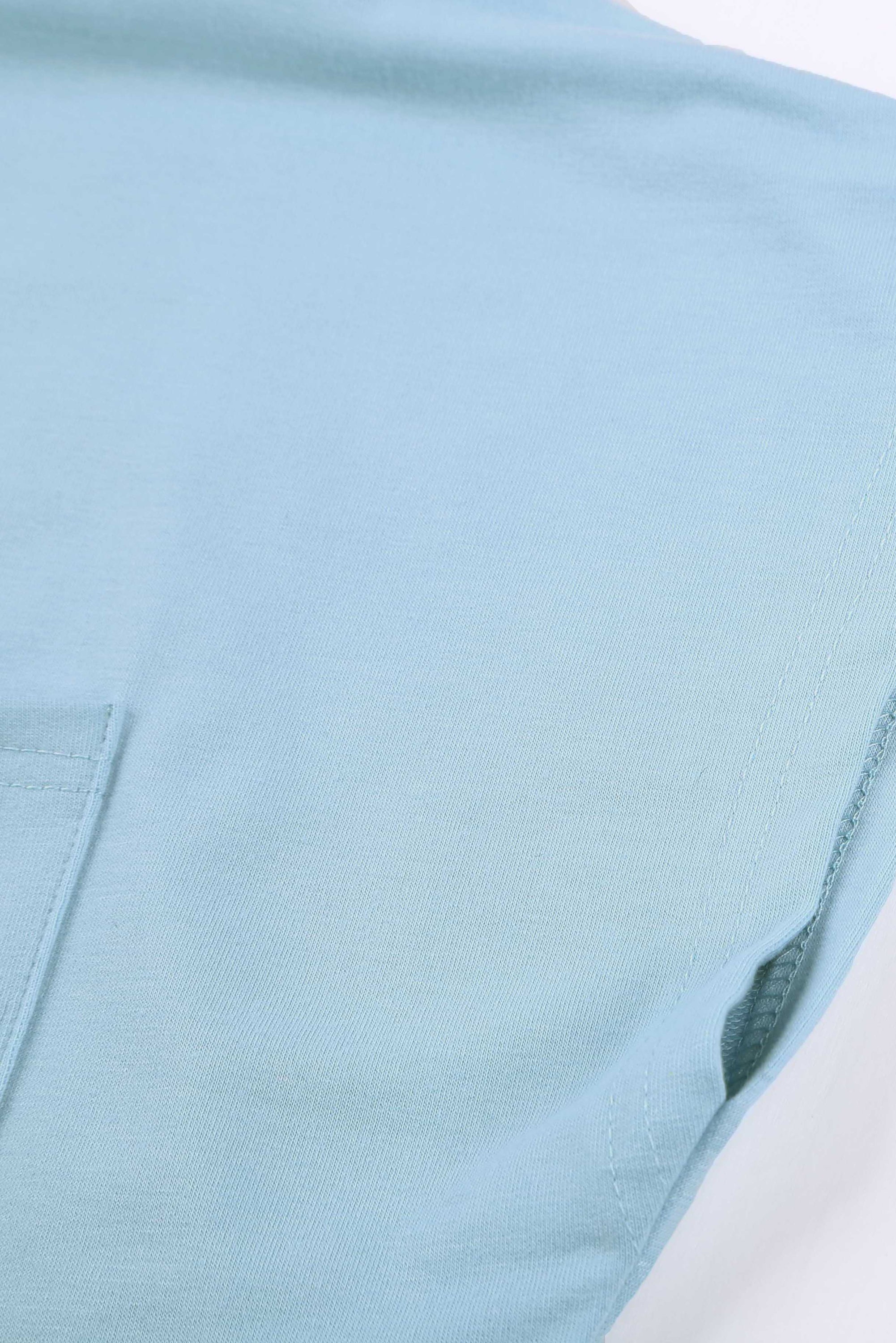 Sky Blue Knit Pocketed Side Slits Short Sleeve Tee featuring a relaxed fit, bust pocket, and side slits, perfect for summer wear.