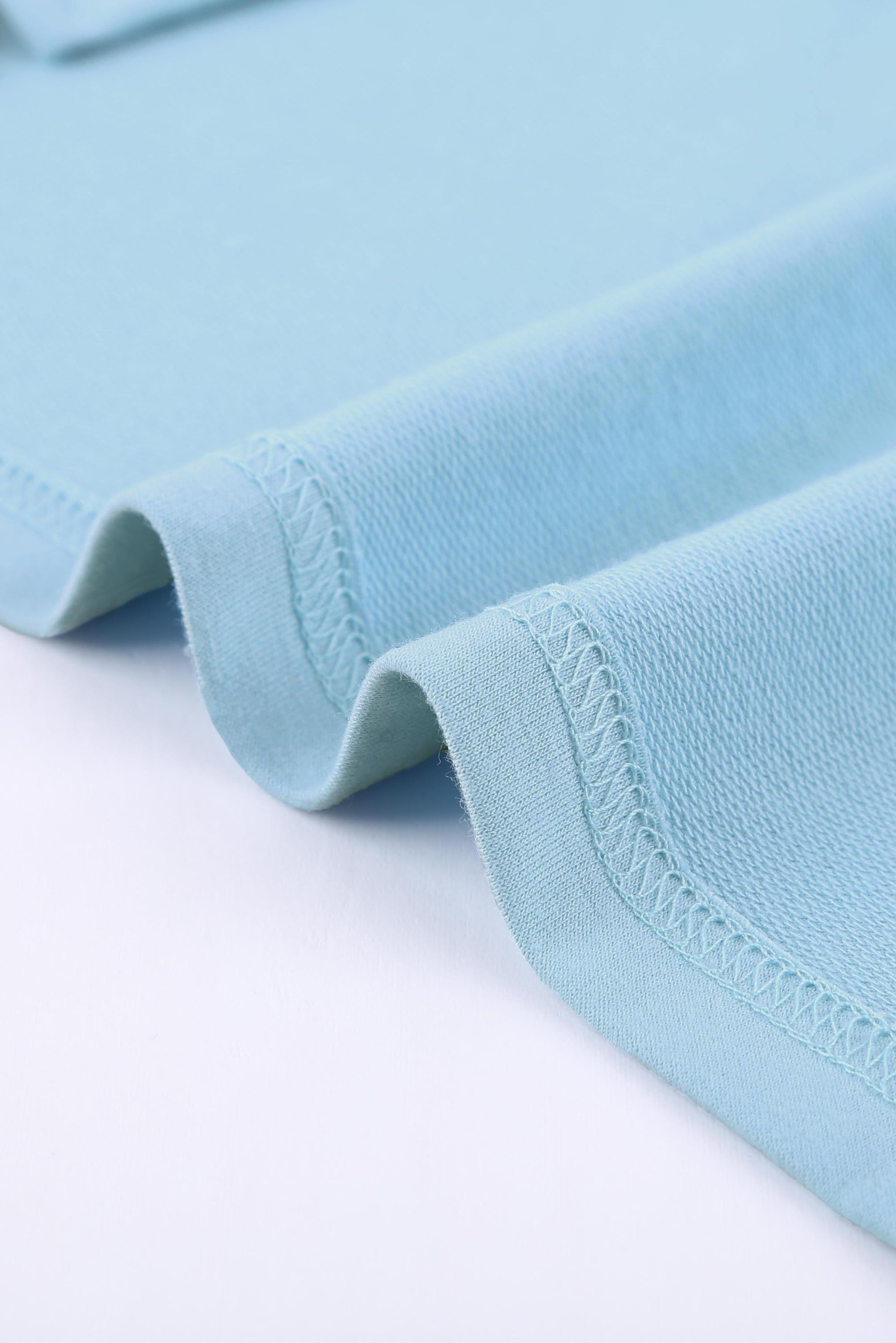 Sky Blue Knit Pocketed Side Slits Short Sleeve Tee featuring a relaxed fit, bust pocket, and side slits, perfect for summer wear.