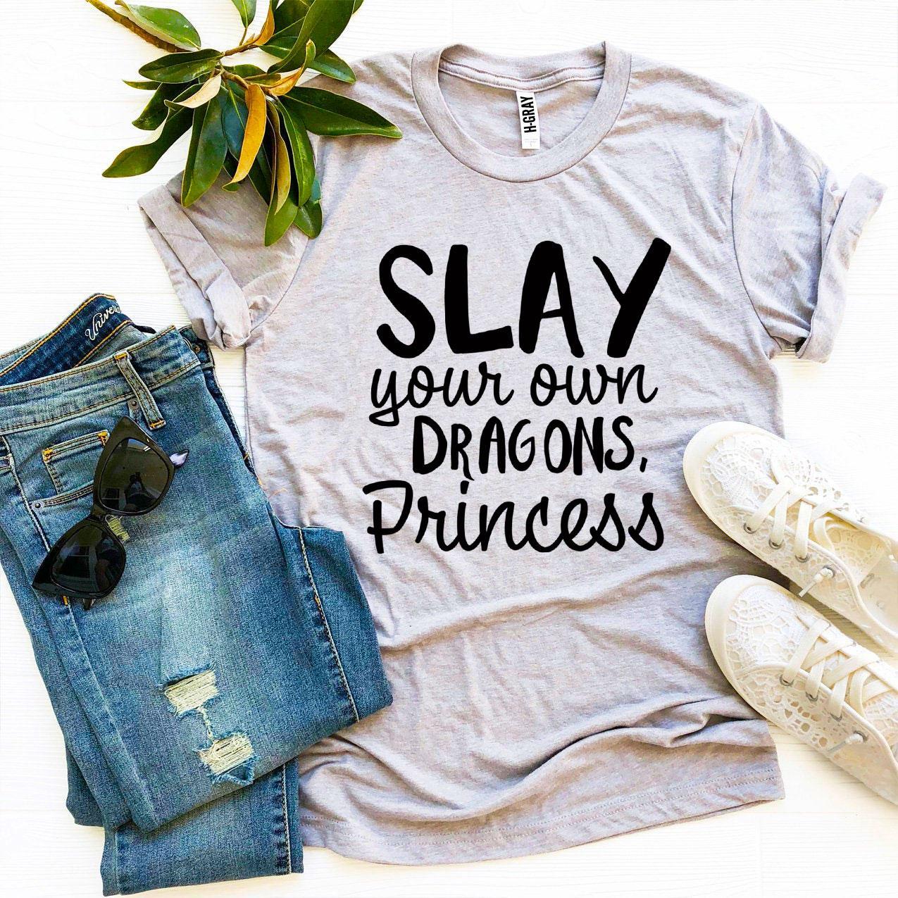 Slay Your Own Dragons Princess T-shirt made of soft ring spun cotton with a bold design, available in various sizes.