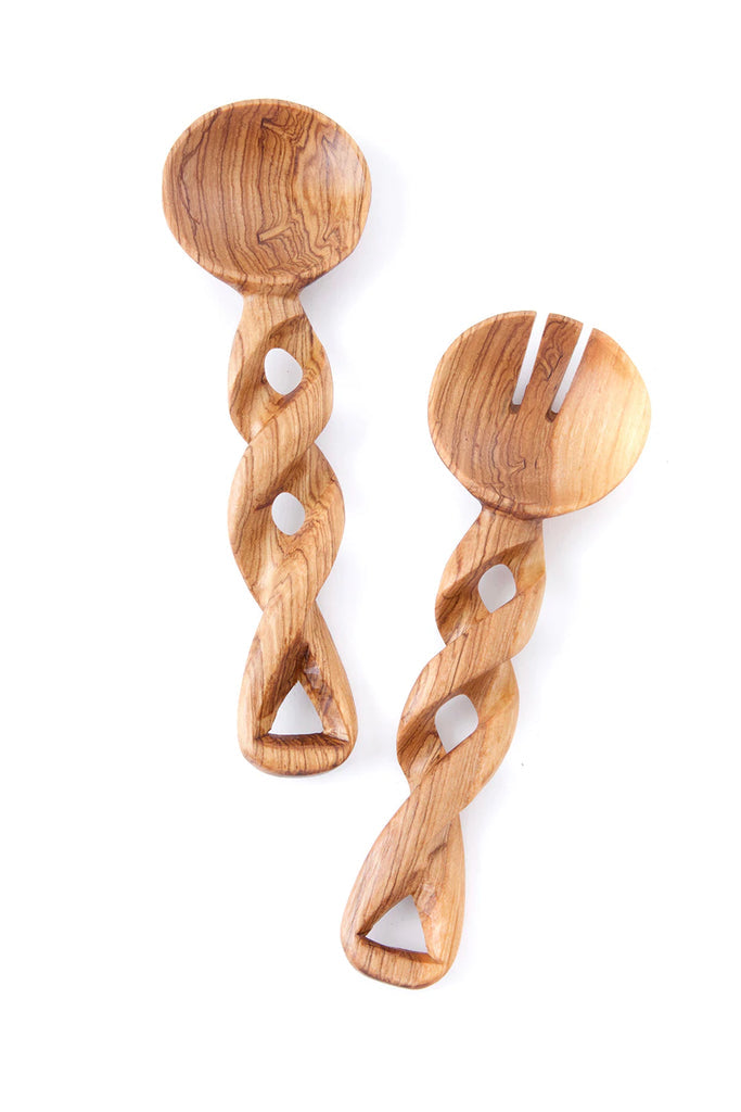 Small olive wood salad server with a seamless spiral handle, handcrafted by Kenyan artisans, showcasing unique grain patterns.