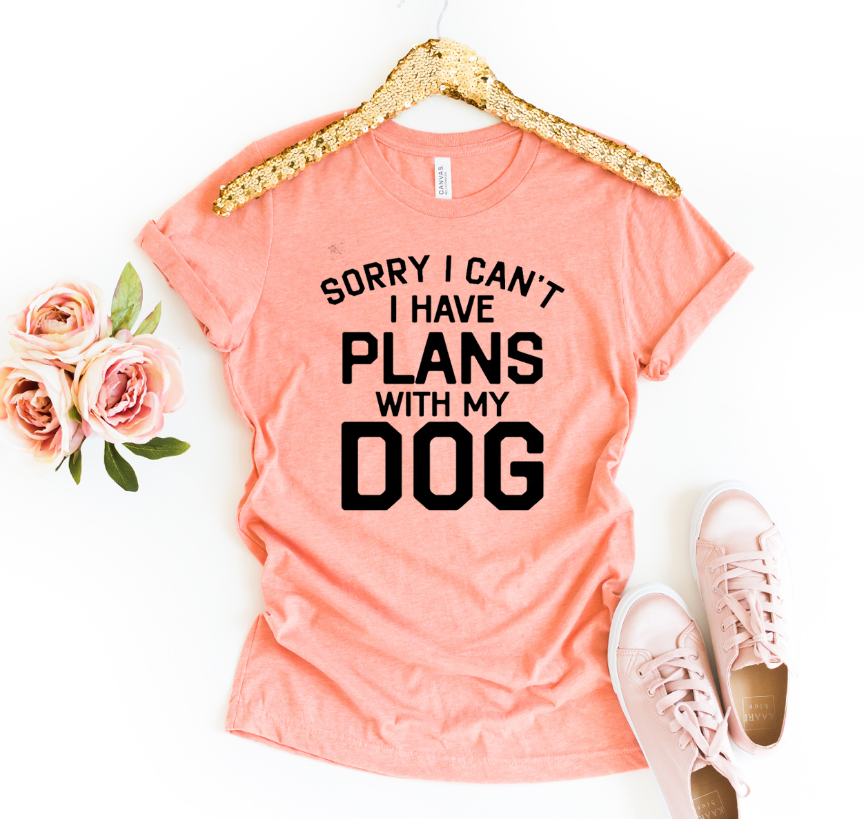 A stylish 'Sorry I Can't I Have Plans With My Dog' T-shirt made from premium quality ring spun cotton, featuring a playful design.