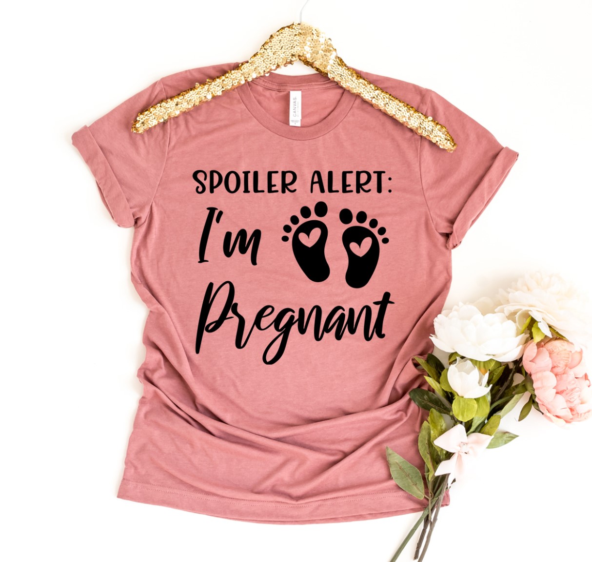 Spoiler Alert I'm Pregnant T-shirt made of soft ring spun cotton, featuring a playful print in a comfortable retail fit.