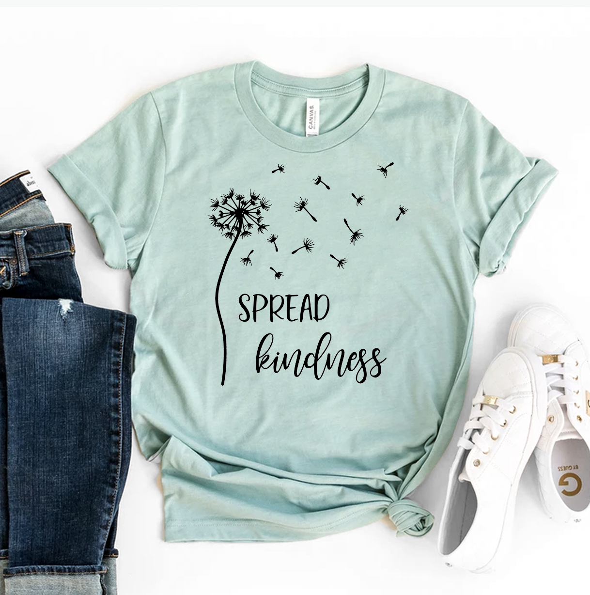 A stylish Spread Kindness T-shirt made from premium ring spun cotton, featuring a soft flex print design, available in various sizes.