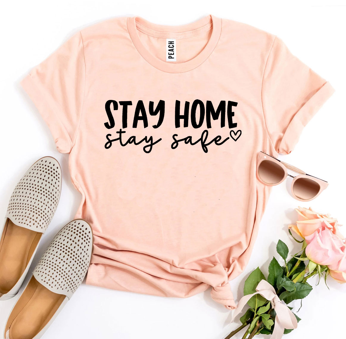 Stay Home Stay Safe T-shirt made from premium ring spun cotton, featuring a vibrant flex print design, available in various sizes.