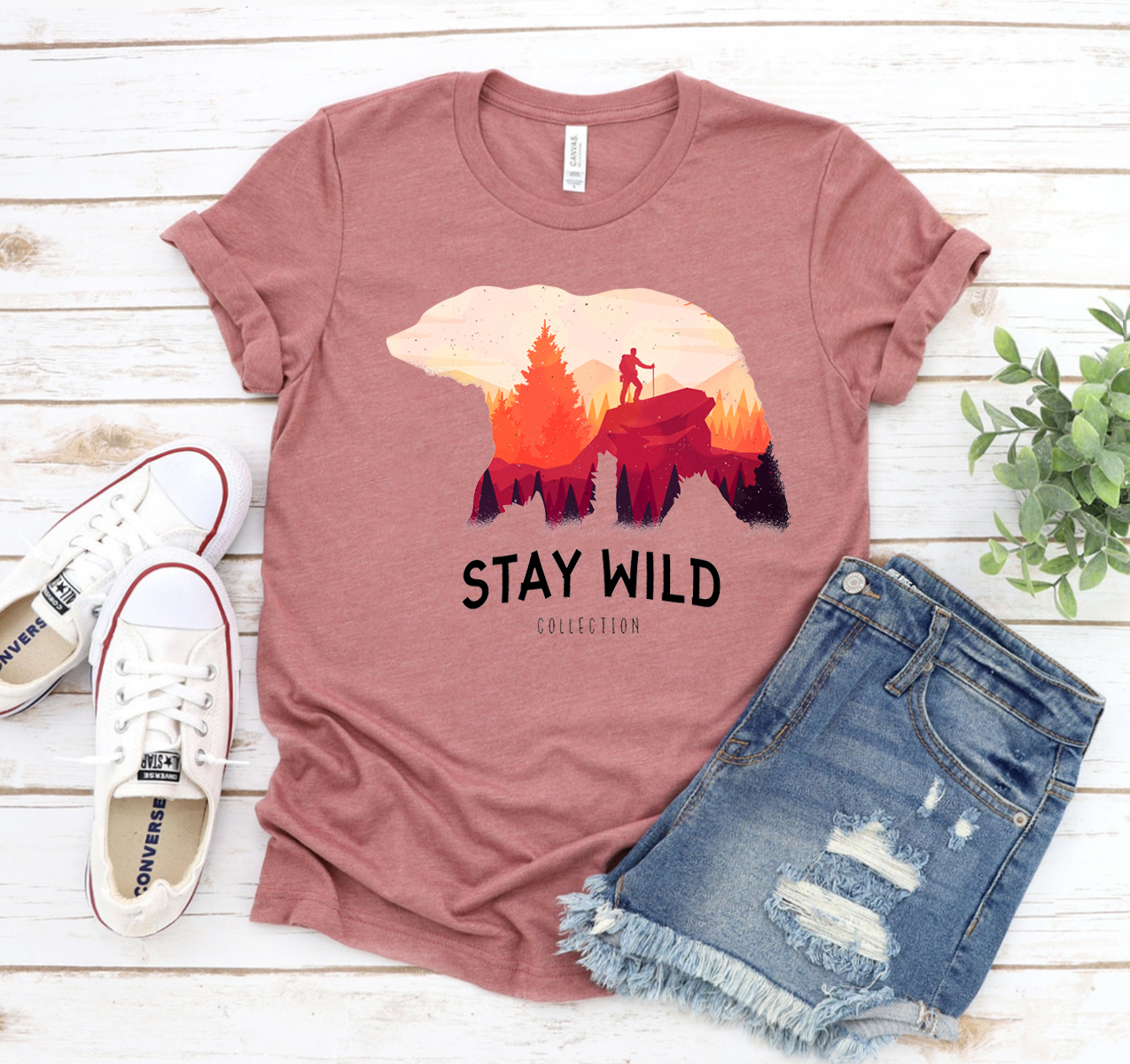 Stay Wild T-shirt displayed on a mannequin, showcasing its unisex design and soft fabric.