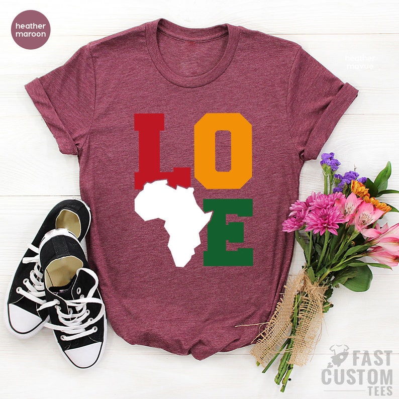 A vibrant Summer Printed T-Shirt featuring African cultural designs, made from a cotton-polyester blend, perfect for casual wear.