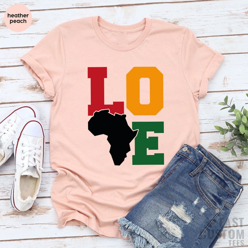 A vibrant Summer Printed T-Shirt featuring African cultural designs, made from a cotton-polyester blend, perfect for casual wear.