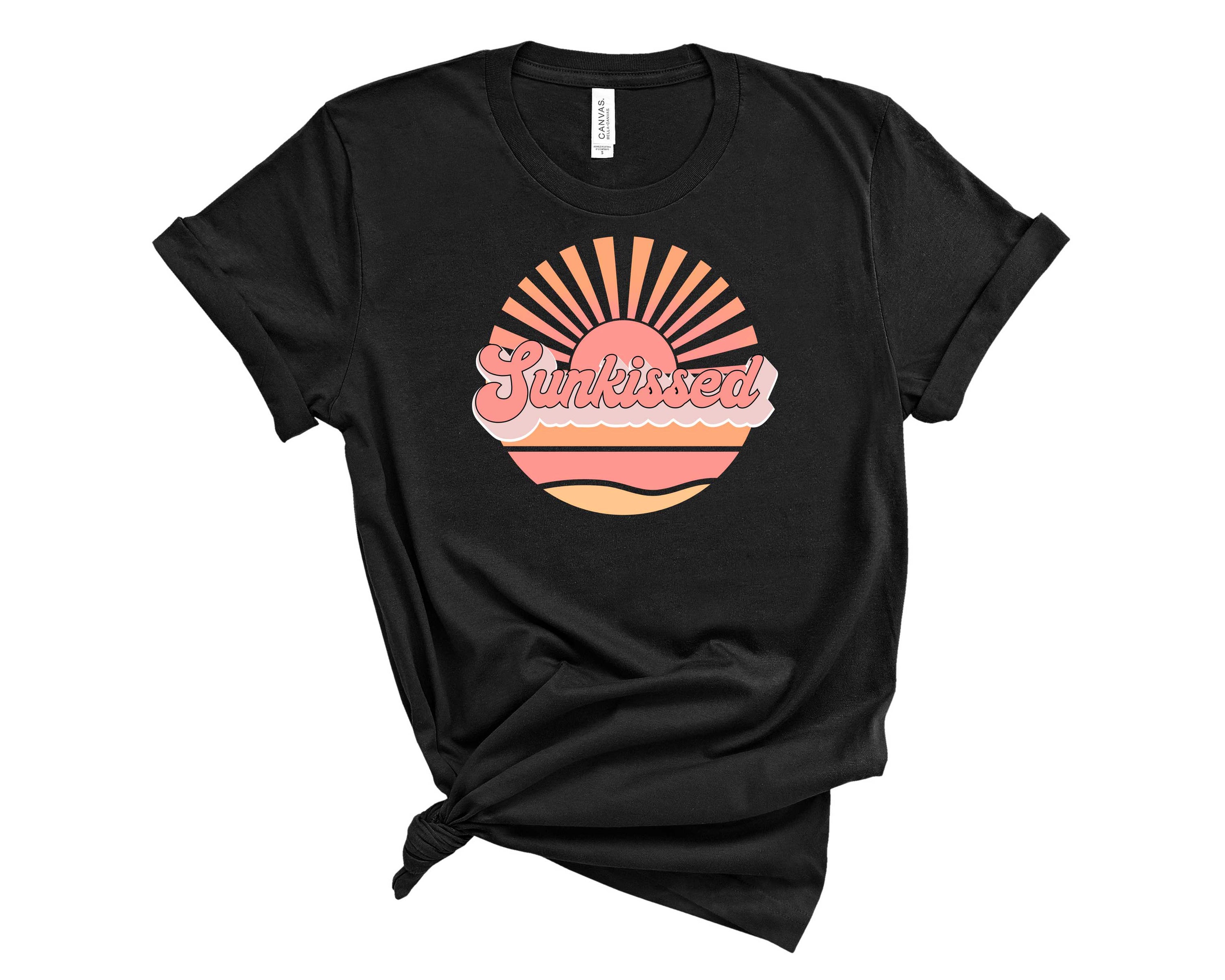 Sun Kissed Graphic Tee featuring a vibrant design on a soft fabric, suitable for unisex wear.