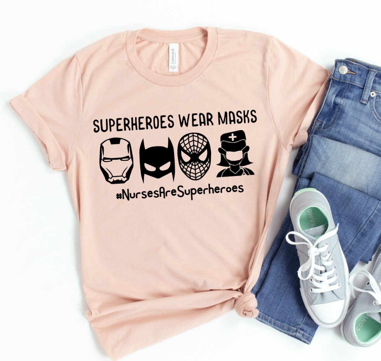 A stylish Superheroes Wear Masks Shirt made of premium ring spun cotton, featuring a vibrant flex print design, available in various sizes.