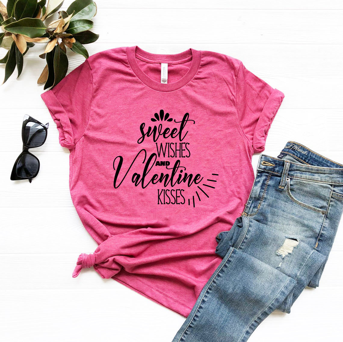 Unisex Sweet Wishes And Valentine Kisses Tee in various colors, showcasing its soft fabric and stylish design.