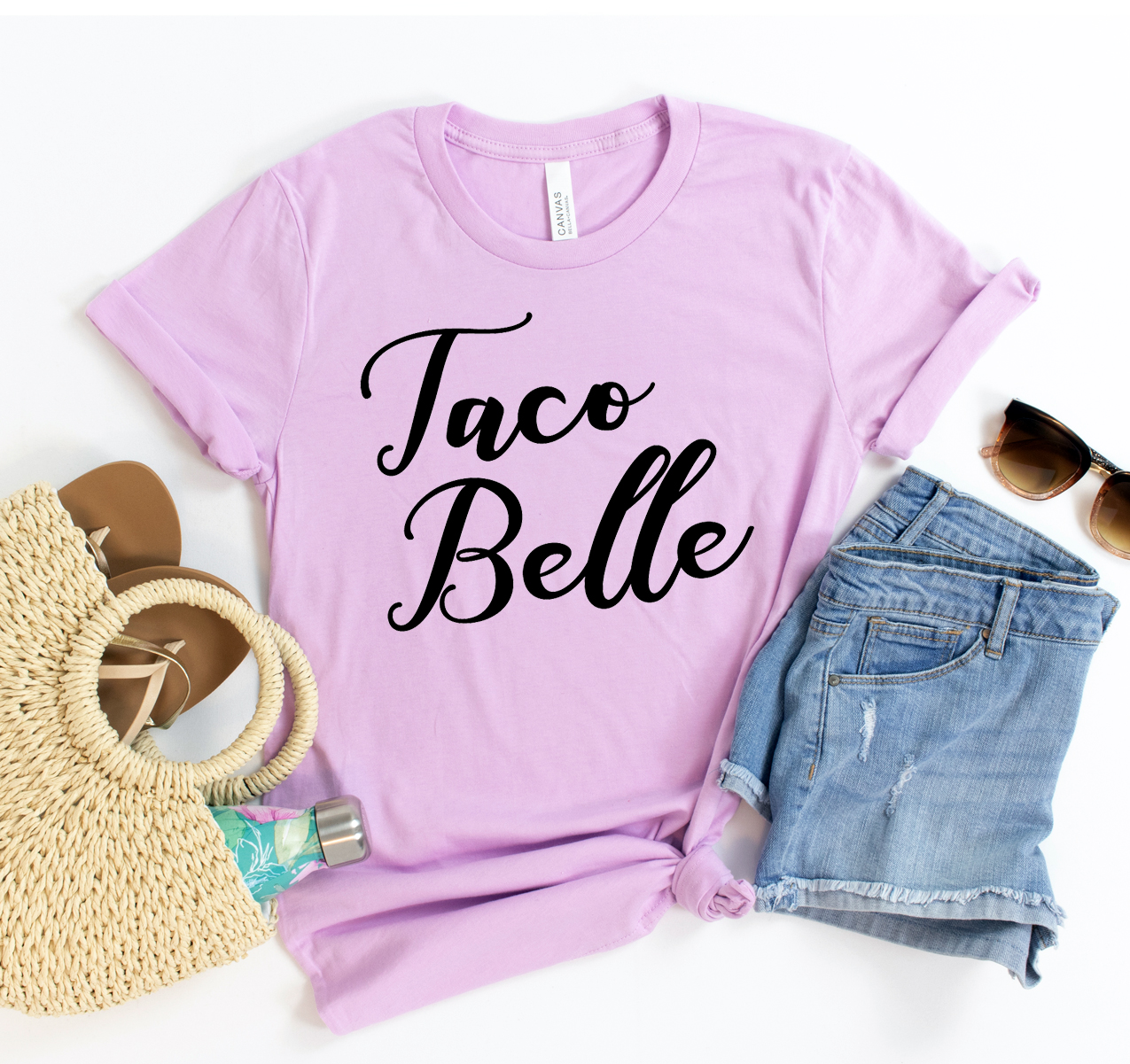 Taco Belle T-shirt displayed on a hanger, showcasing its soft fabric and unisex design.