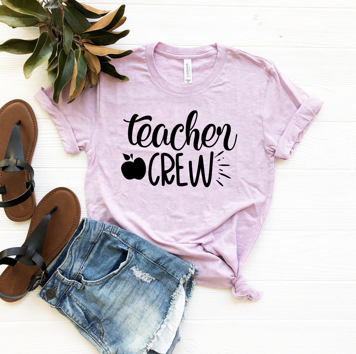 A comfortable unisex Teacher Crew Shirt in various colors, showcasing its soft fabric and classic crew neck design.