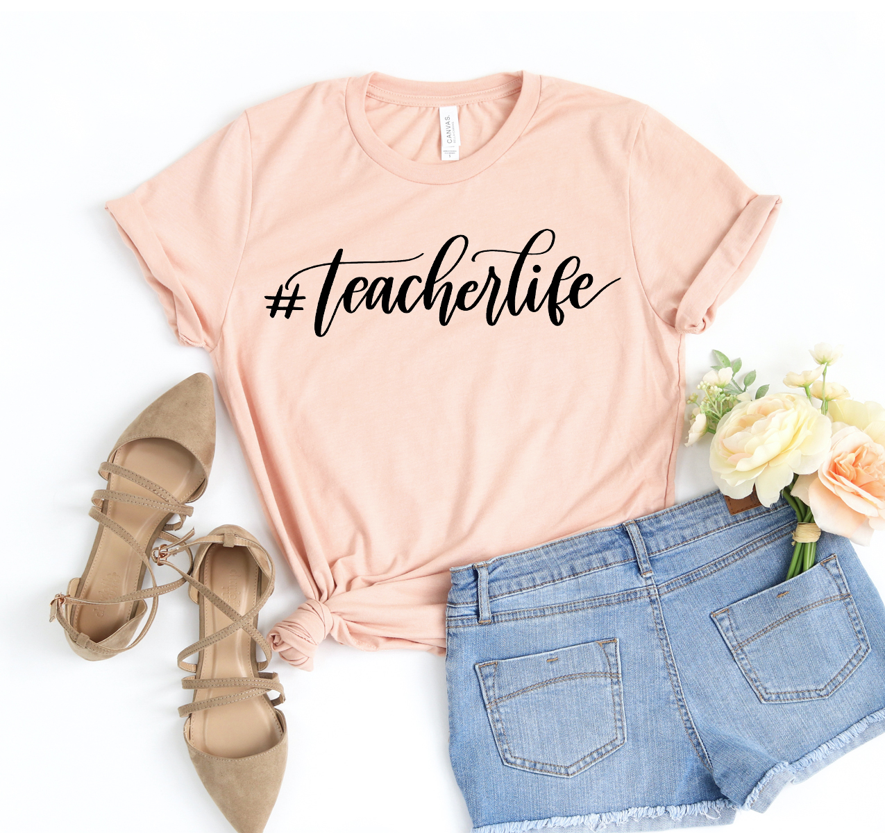 A stylish Teacher Life T-shirt made from soft, high-quality cotton, featuring a classic unisex design suitable for all educators.