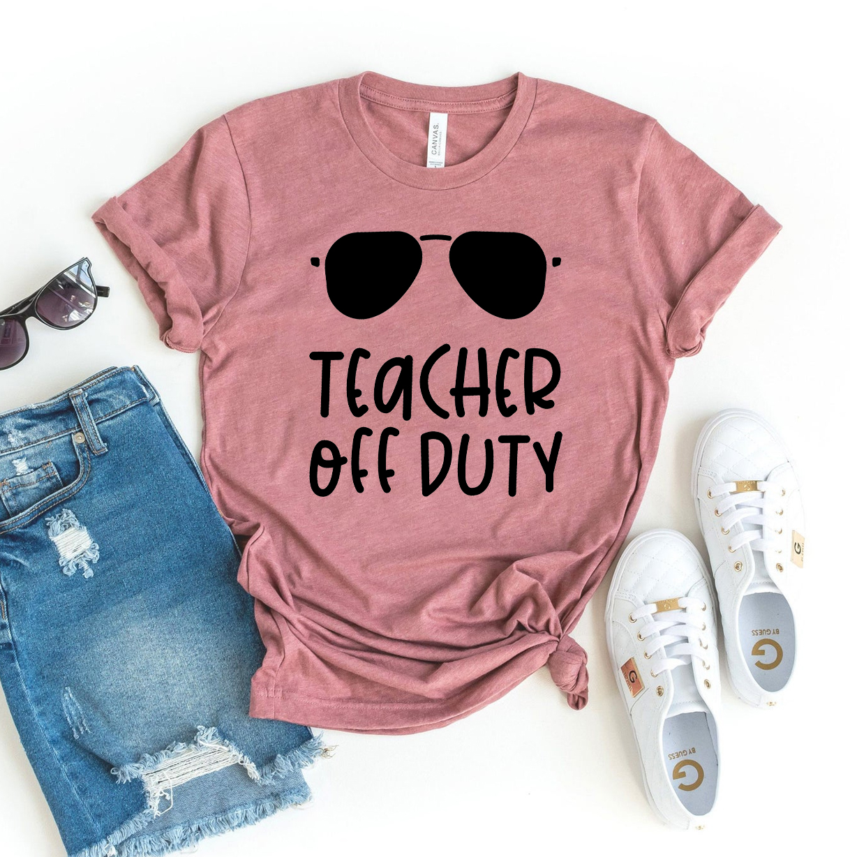 Teacher Off Duty T-shirt made from premium ring spun cotton, featuring a soft textile flex print design.