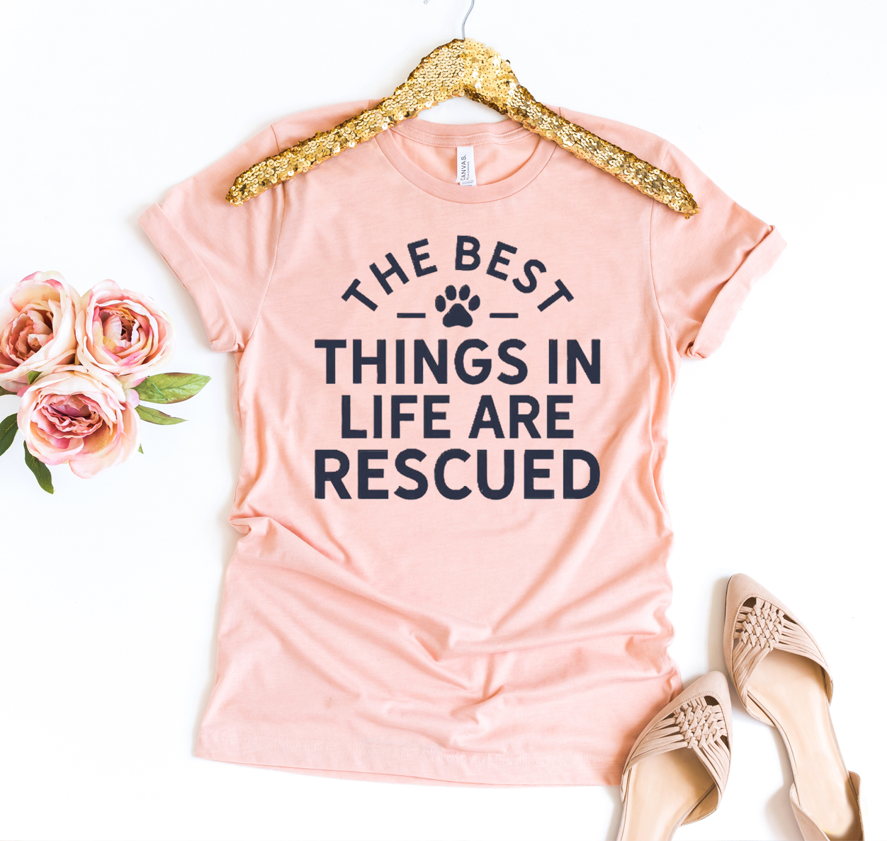 The Best Things In Life Are Rescued T-shirt displayed on a mannequin, showcasing its soft fabric and vibrant print.