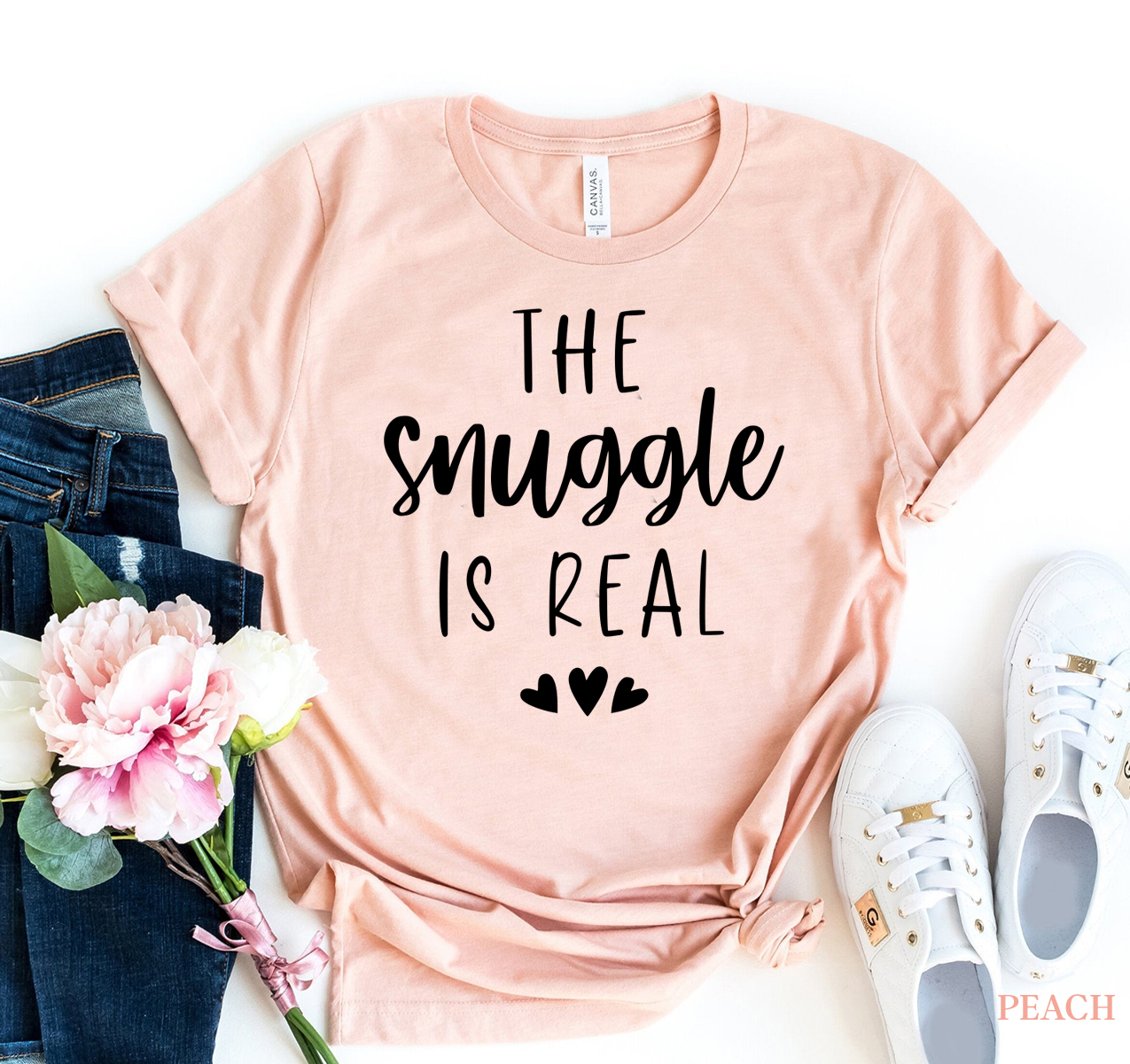 The Snuggle Is Real T-shirt displayed on a mannequin, showcasing its soft fabric and vibrant print.