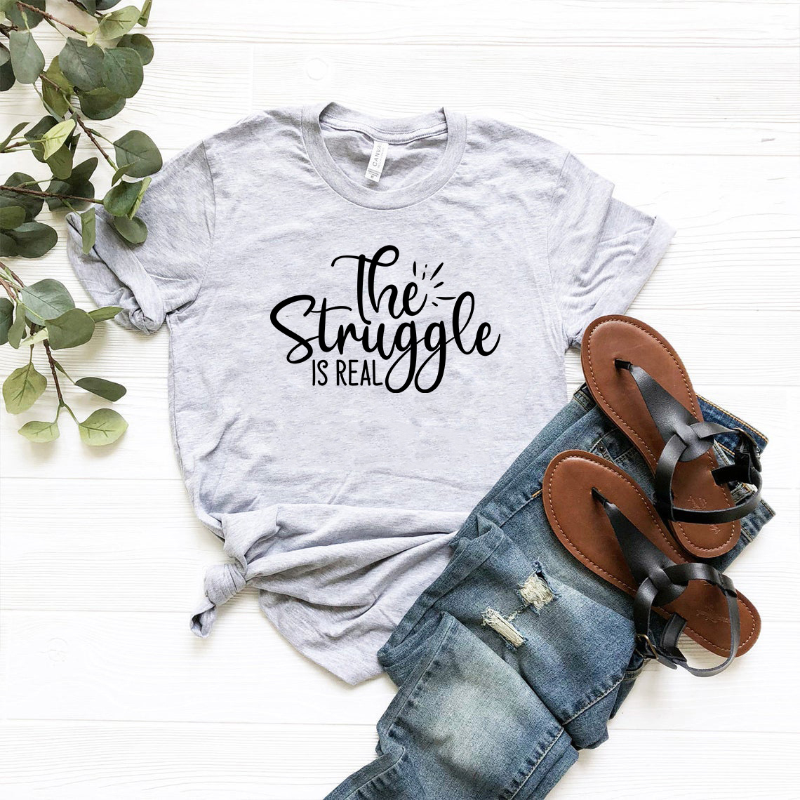 The Struggle Is Real Shirt in various colors, showcasing its soft fabric and stylish design.