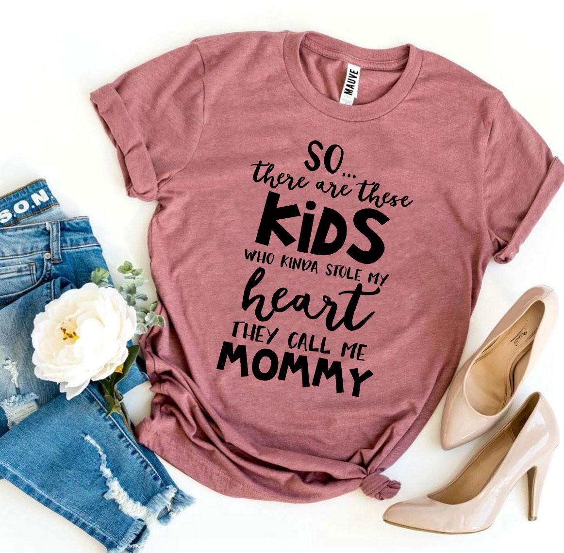 A stylish 'They Call Me Mommy' T-shirt made from premium ring spun cotton, featuring a vibrant flex print design.