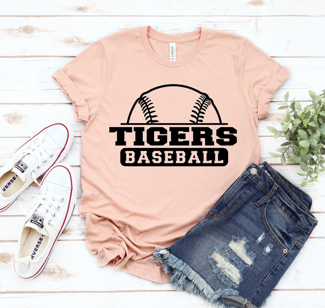 Tigers Baseball T-shirt displayed on a hanger, showcasing its unisex design and soft fabric.