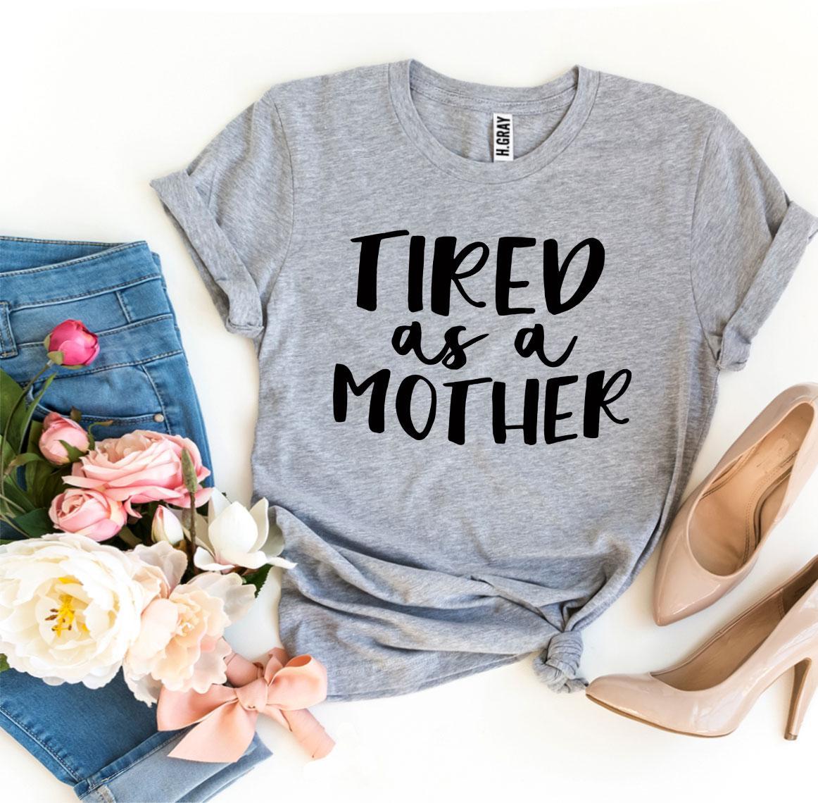 Tired As a Mother T-shirt in premium ring spun cotton, featuring a stylish print and available in various sizes.