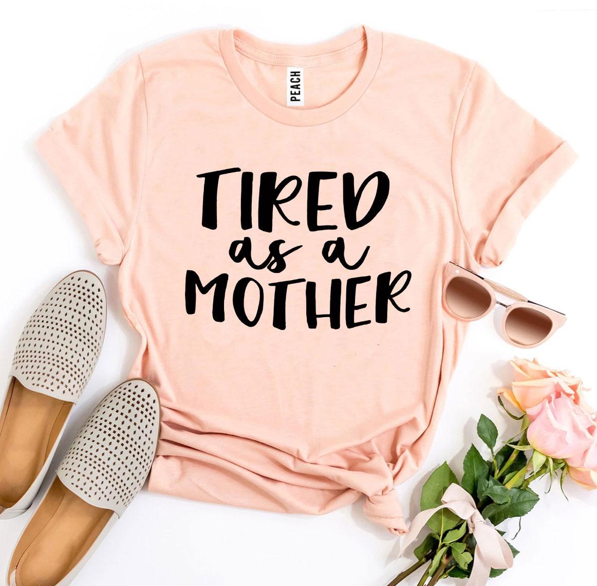 Tired As a Mother T-shirt in premium ring spun cotton, featuring a stylish print and available in various sizes.