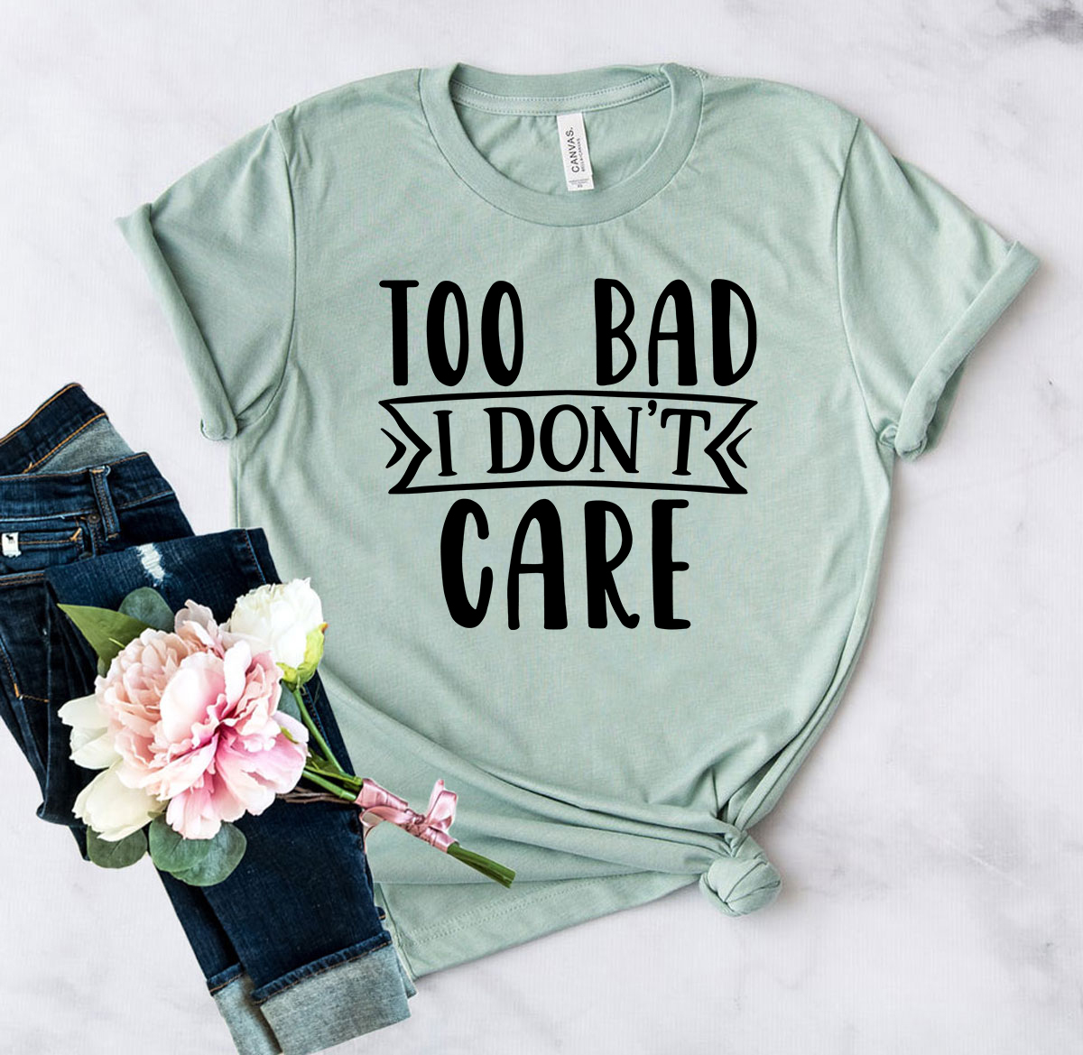 A stylish unisex T-shirt featuring the phrase 'Too Bad I Don't Care', made from soft ring spun cotton, available in multiple colors.