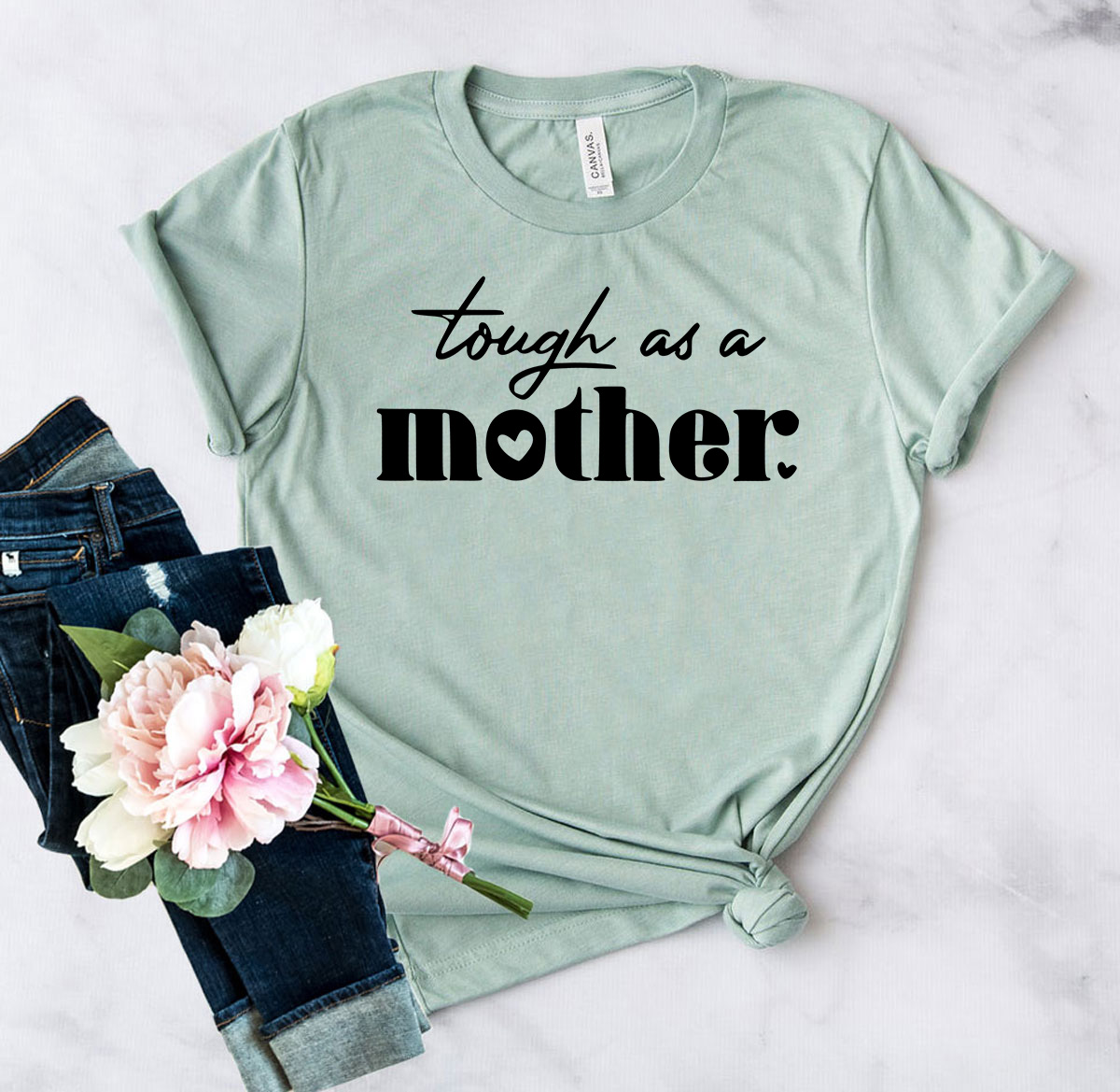 A stylish Tough As A Mother Shirt in various colors, showcasing its comfortable fabric and modern design.