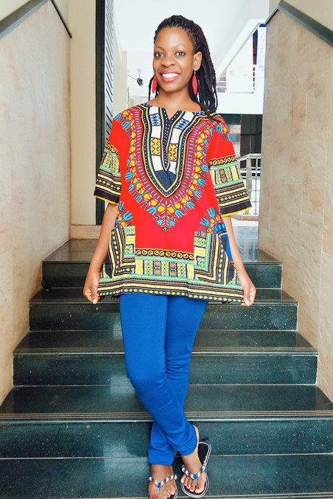 Traditional Dashiki African Shirt made of 100% cotton with vibrant print, showcasing front and back design.