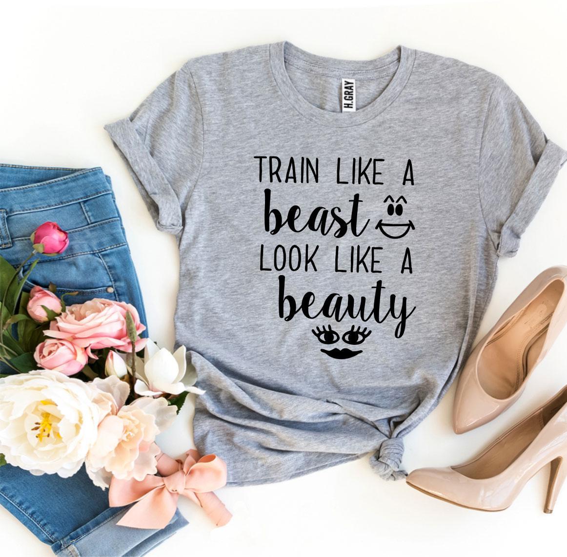 Train Like a Beast Look Like a Beauty T-shirt in various sizes, showcasing its premium quality and stylish design.