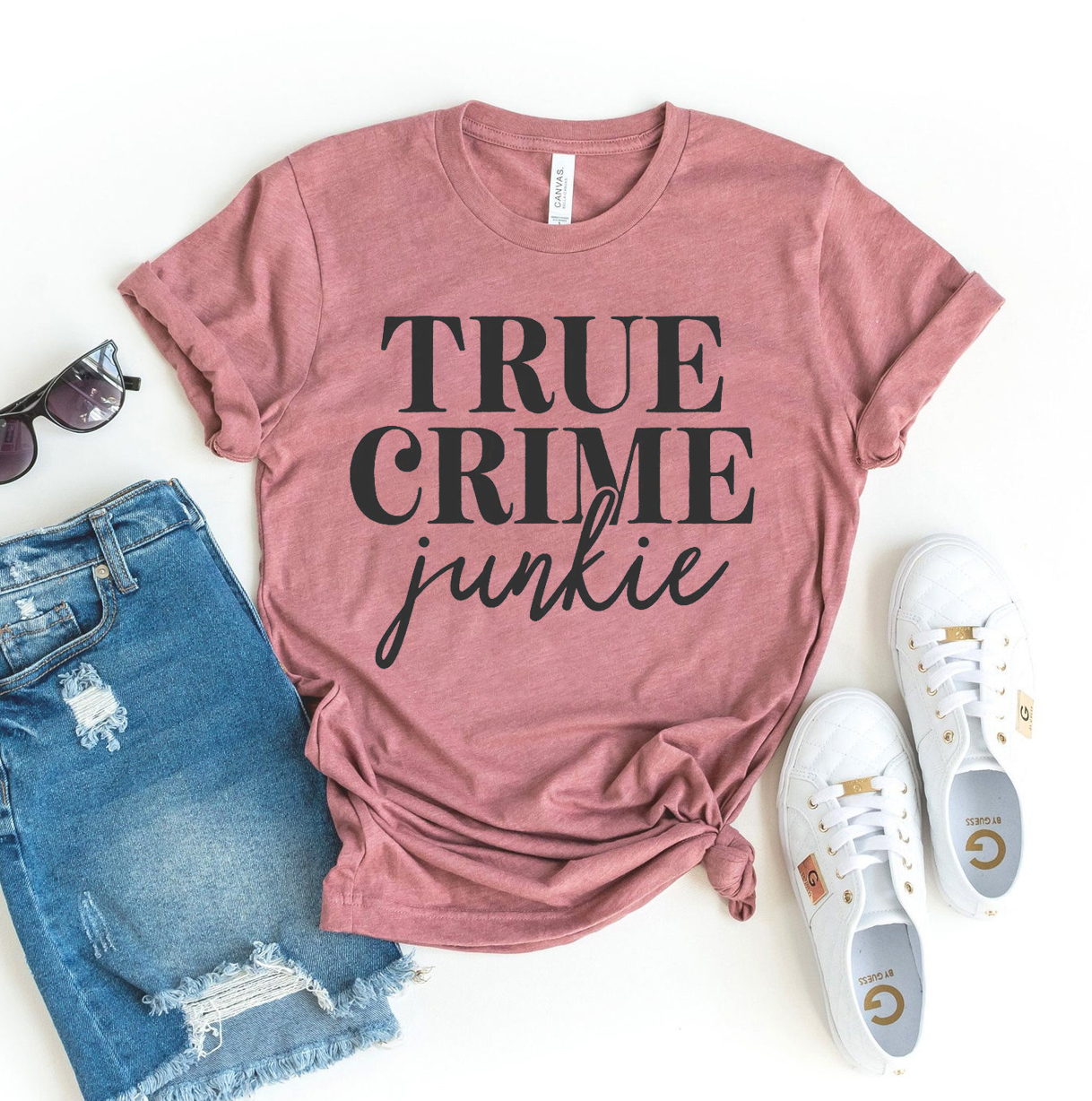 True Crime Junkie T-shirt made of premium ring spun cotton with a striking design, available in various sizes.