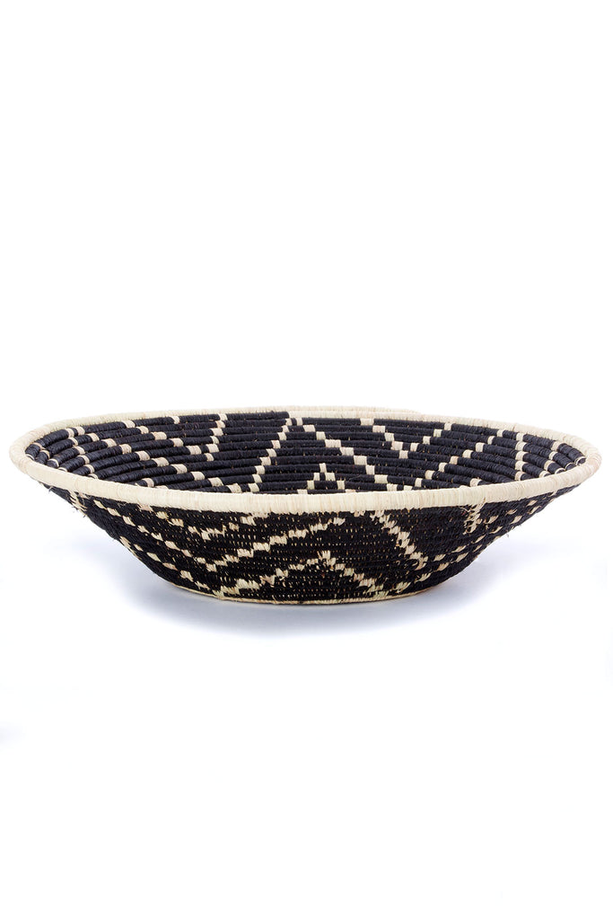 Handcrafted Uganda sisal wall and storage basket made from natural fibers, showcasing intricate weaving patterns and earthy tones.