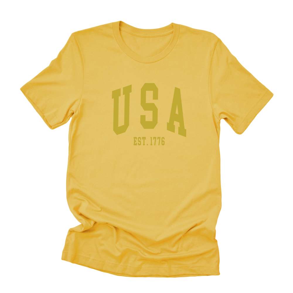 USA est 1776 Short Sleeve T-Shirt in soft cotton with a relaxed fit and distressed design, perfect for casual wear.