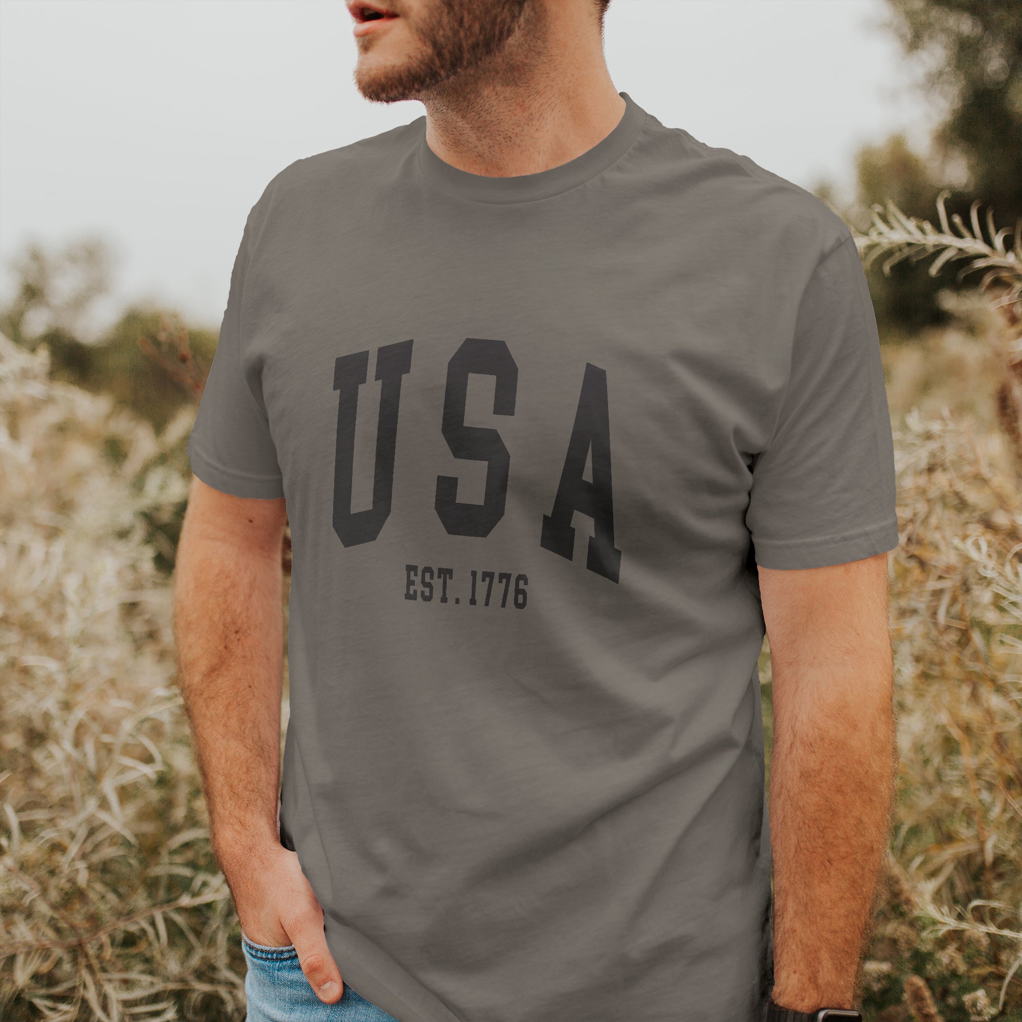 USA est 1776 Short Sleeve T-Shirt in soft cotton with a relaxed fit and distressed design, perfect for casual wear.