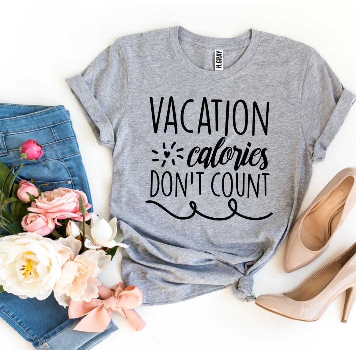 A stylish Vacation Calories Don’t Count T-shirt made from premium ring spun cotton, featuring a playful slogan in vibrant print.