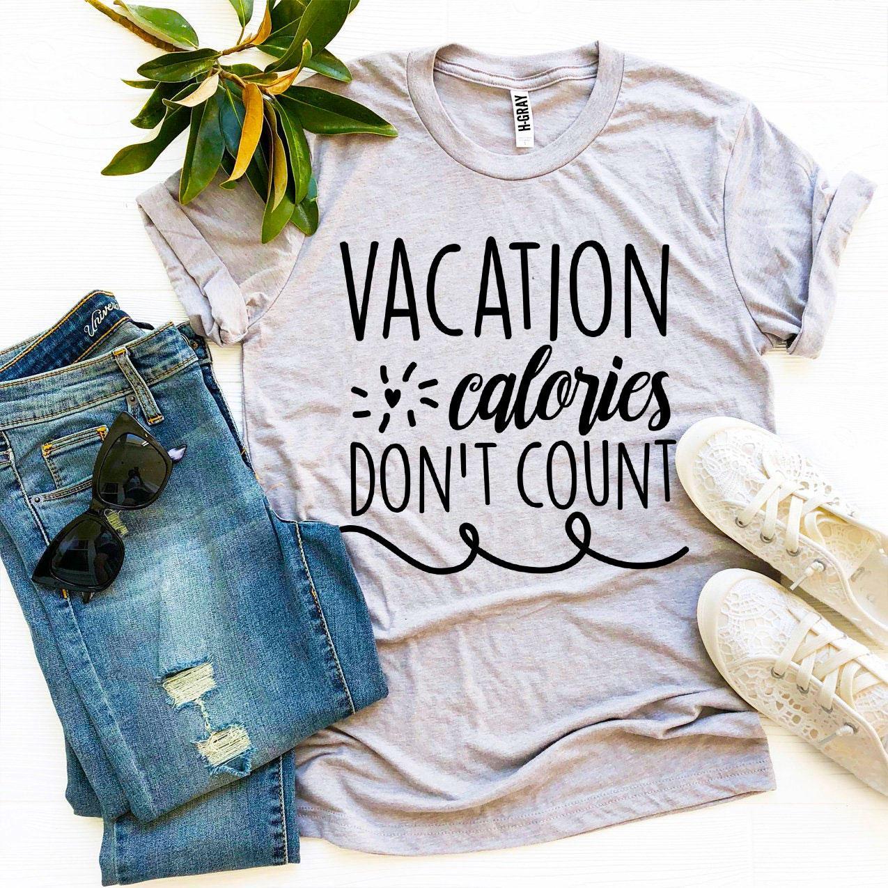 A stylish Vacation Calories Don’t Count T-shirt made from premium ring spun cotton, featuring a playful slogan in vibrant print.