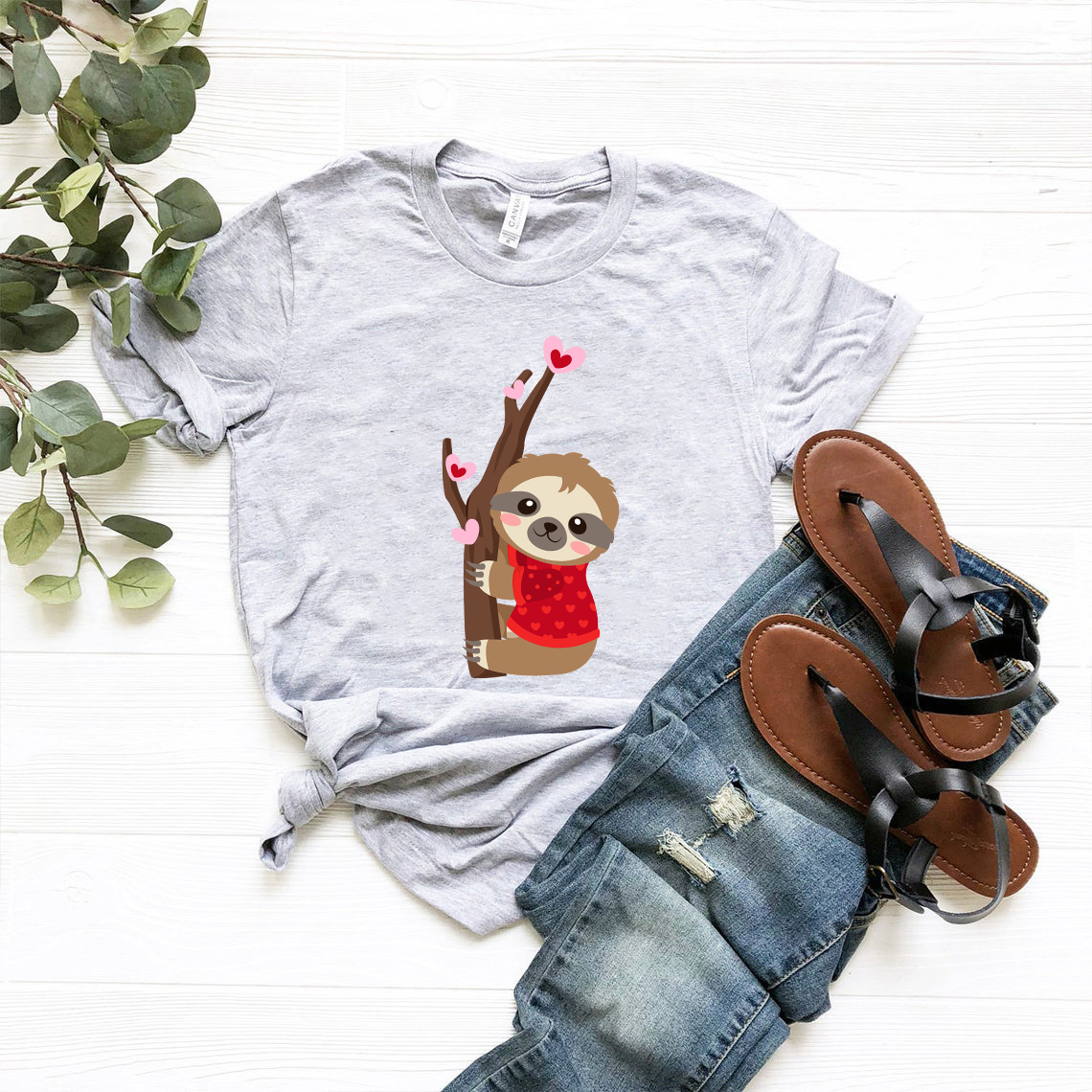 A cozy unisex Valentine Sloth Shirt in various colors, featuring a playful sloth design, perfect for Valentine's Day.