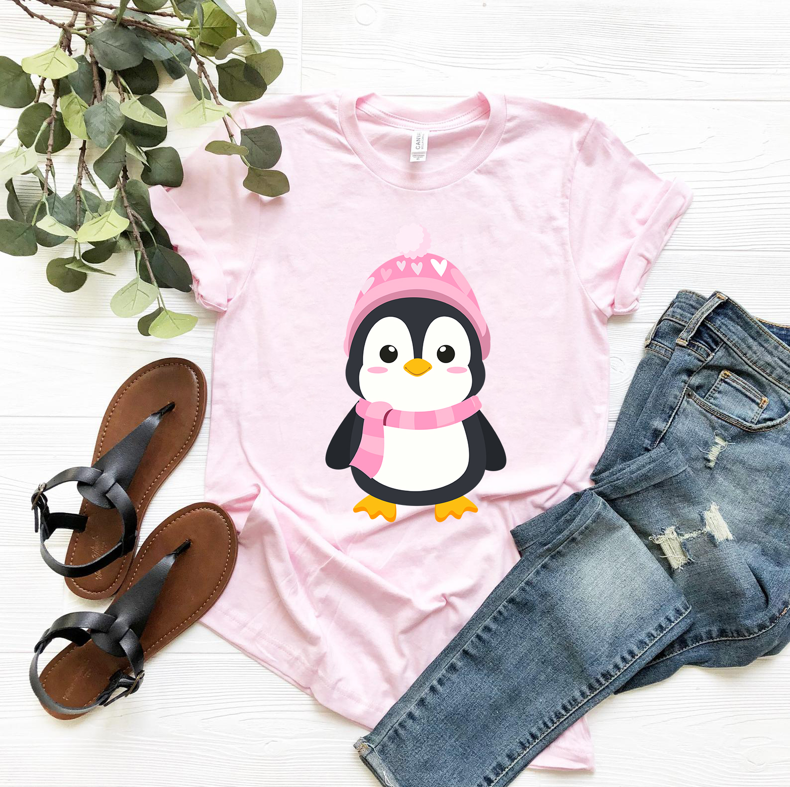 A unisex Valentines Penguin Shirt featuring a cute penguin design, made from soft ring spun cotton, available in various colors.