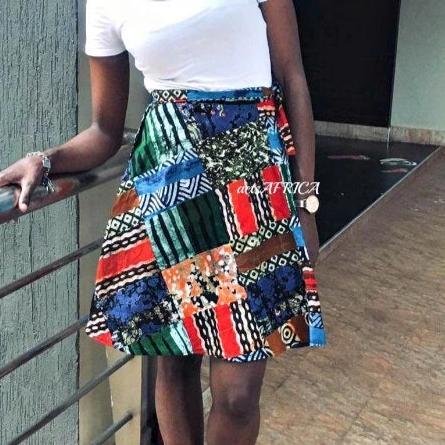 A vibrant Vintage Batik Wrap Mini Kitenge Skirt featuring unique handmade patterns and adjustable straps, perfect for various occasions.