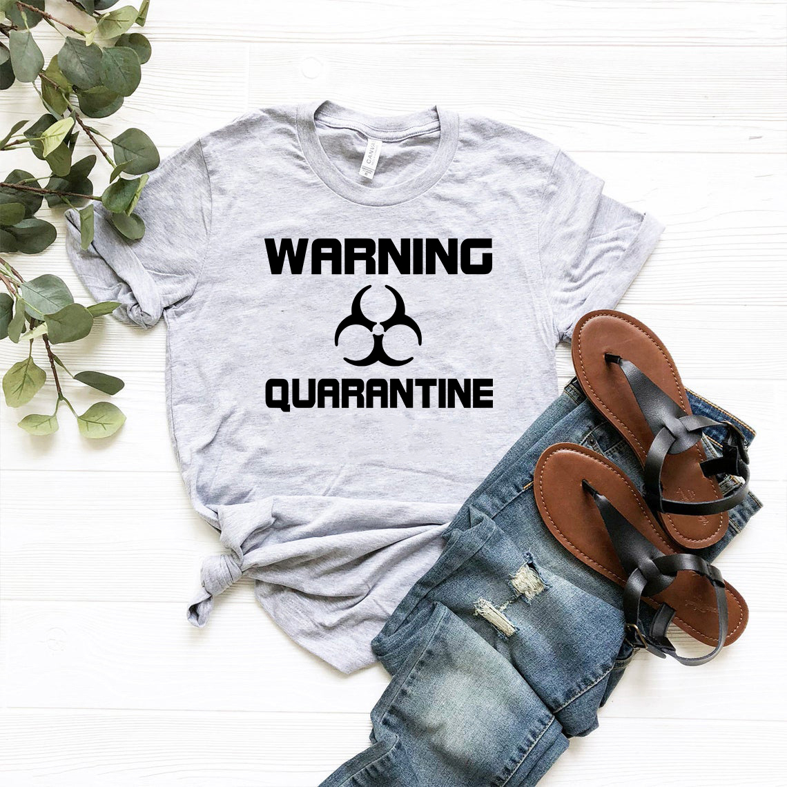 A stylish unisex Warning Quarantine Shirt made from soft ring spun cotton, available in multiple colors and sizes.