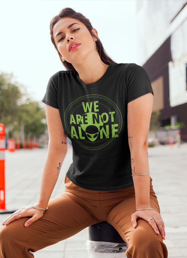 We Are Not Alone Women T-shirt featuring a unique artistic design on soft ringspun cotton fabric.