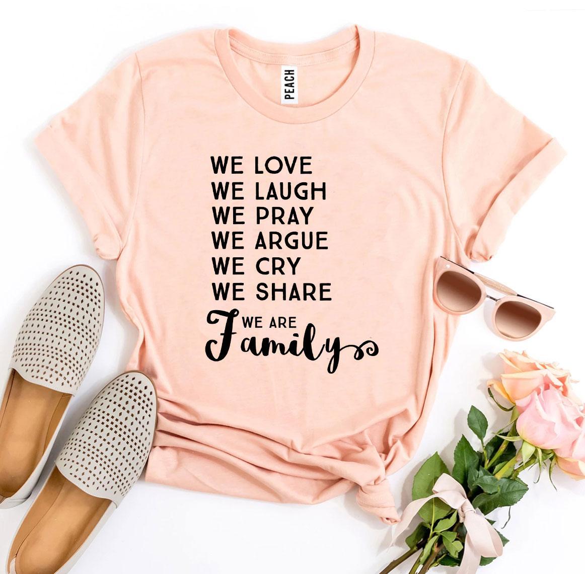 We Love We Laugh We Are Family T-shirt in various sizes, showcasing its soft cotton fabric and vibrant print design.