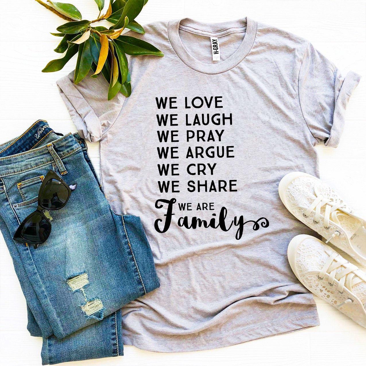 We Love We Laugh We Are Family T-shirt in various sizes, showcasing its soft cotton fabric and vibrant print design.