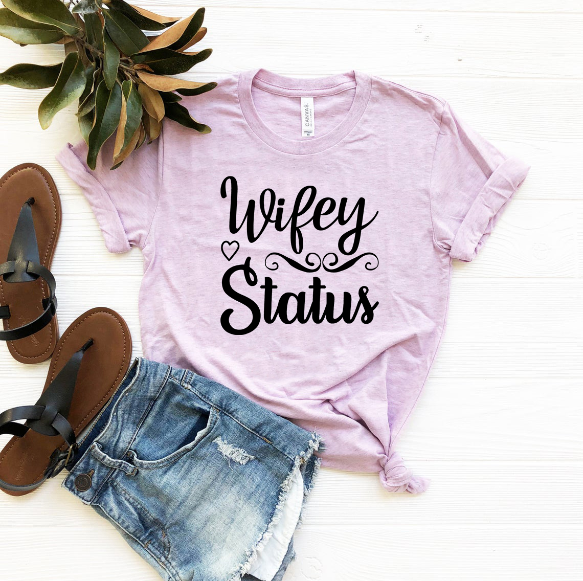 Wifey Status Shirt in various colors, showcasing its comfortable fit and stylish design.