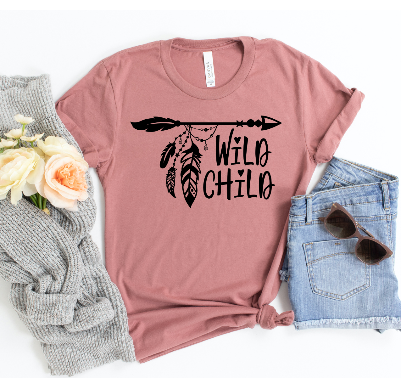 Wild Child T-shirt displayed on a mannequin, showcasing its unisex design and soft fabric.